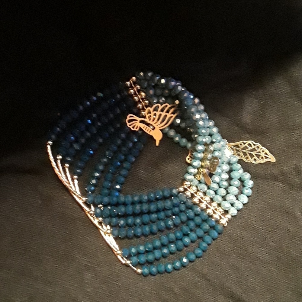 Crystal beats and gold bracelet